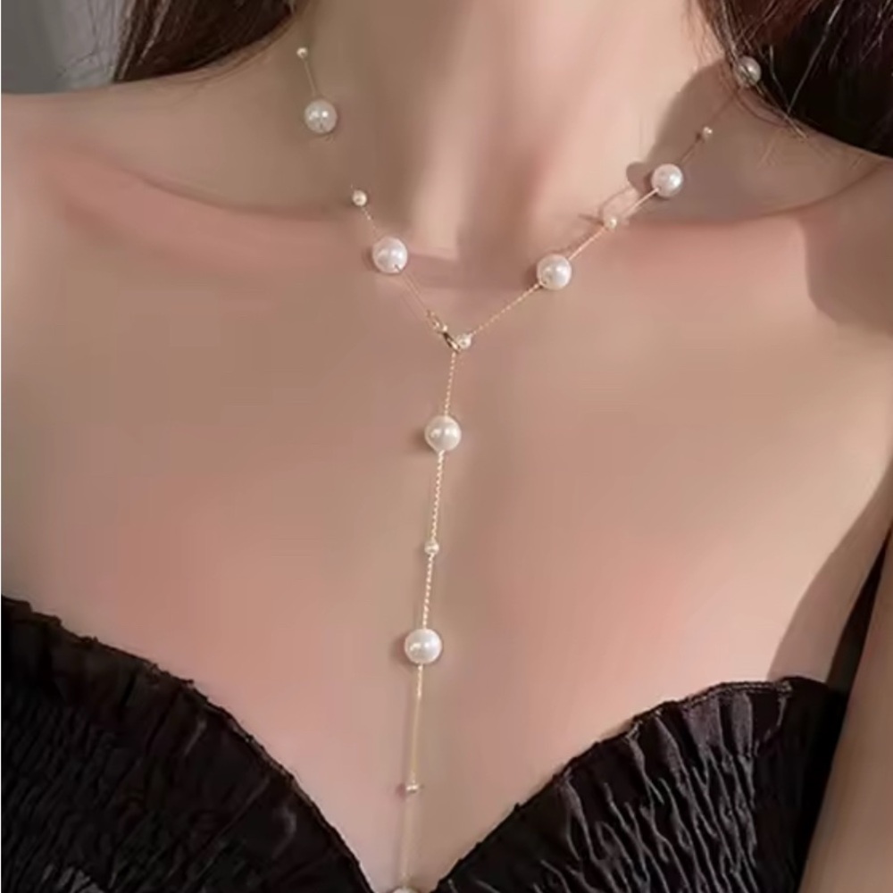 Elegant Gold and White Pearl Necklace